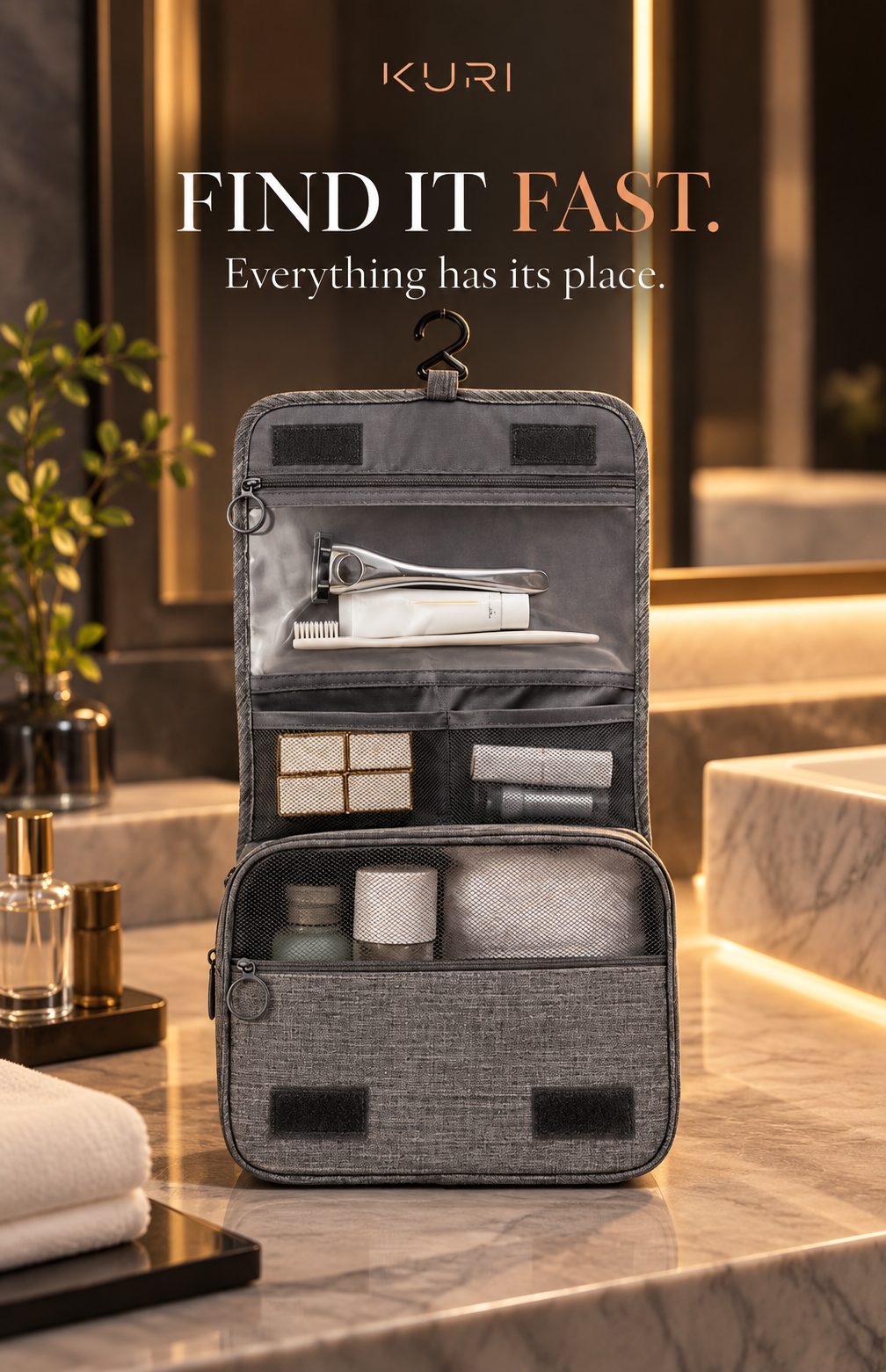 Grey toiletry bag hanging open with a clear zipped pocket, mesh compartments and a larger storage section